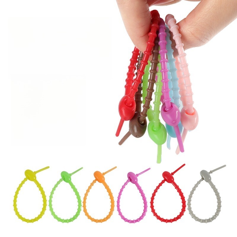 Cable Winder Keychain - Cinta de Silicone Multifuncional Colorida Aleatória